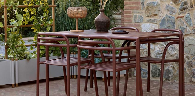 Cane-line Sessel Bliss Outdoor Armlehnstuhl 4 Stück auf Terrasse